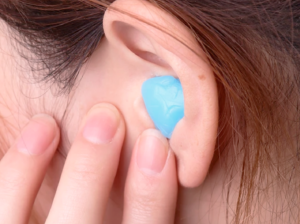 tapones auditivos en Valencia - mano